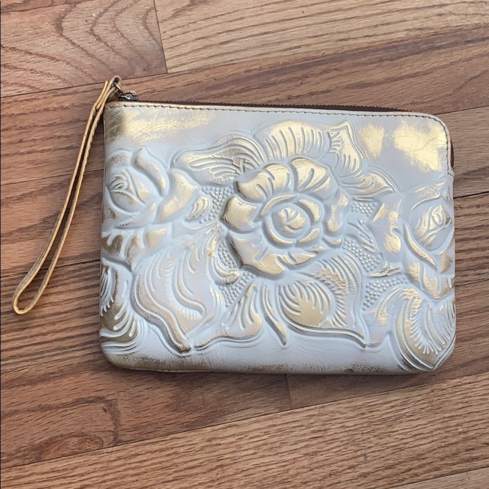 White and gold wristlet